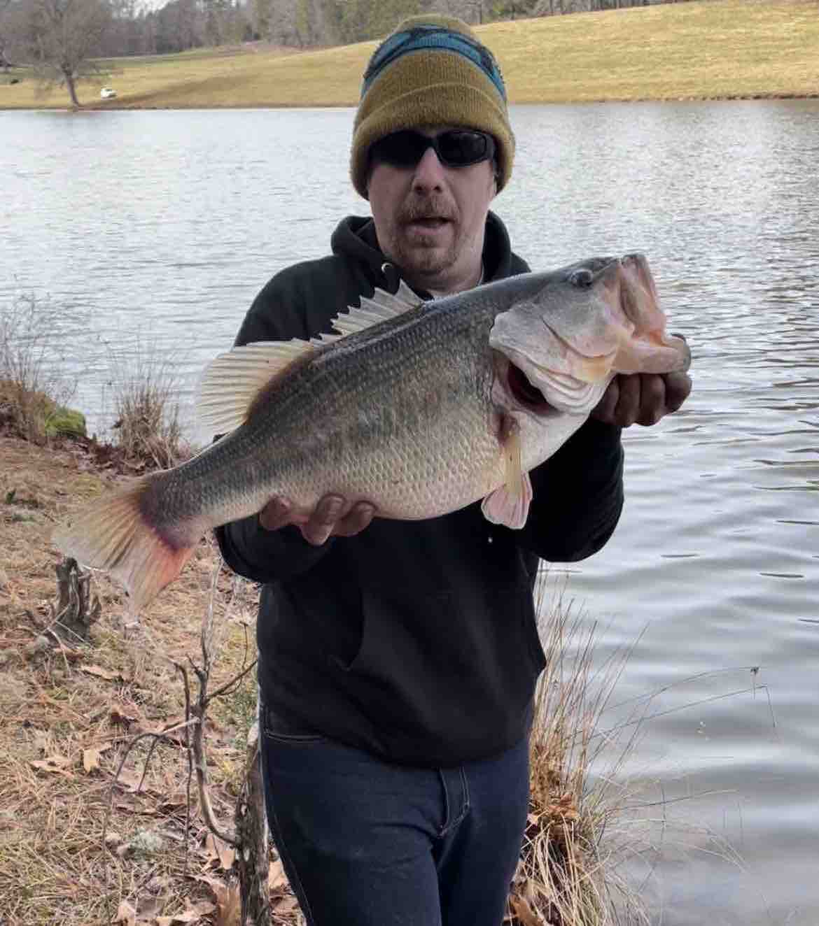 Image of Ian K with a monster Unconfirmed 10 lbs bass caught using a TSA M-450 lure