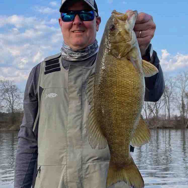 Image of Robbie T with a monster 4.5 lbs bass caught using a TSA Firecraw Flatside lure