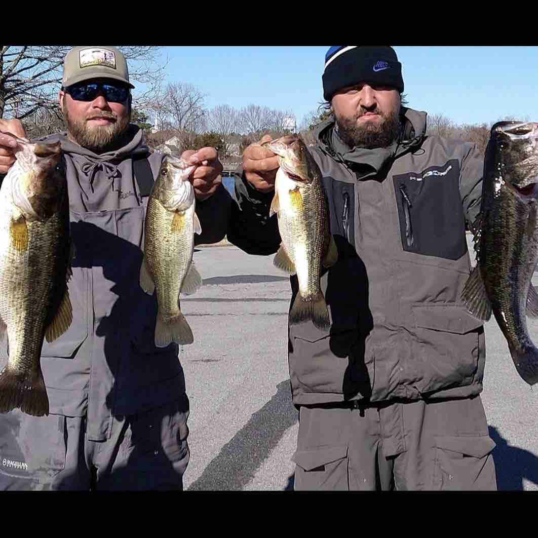 Image of Ronald J with four bass caught using a TSA Firecraw Squarebill lure that won him a contest