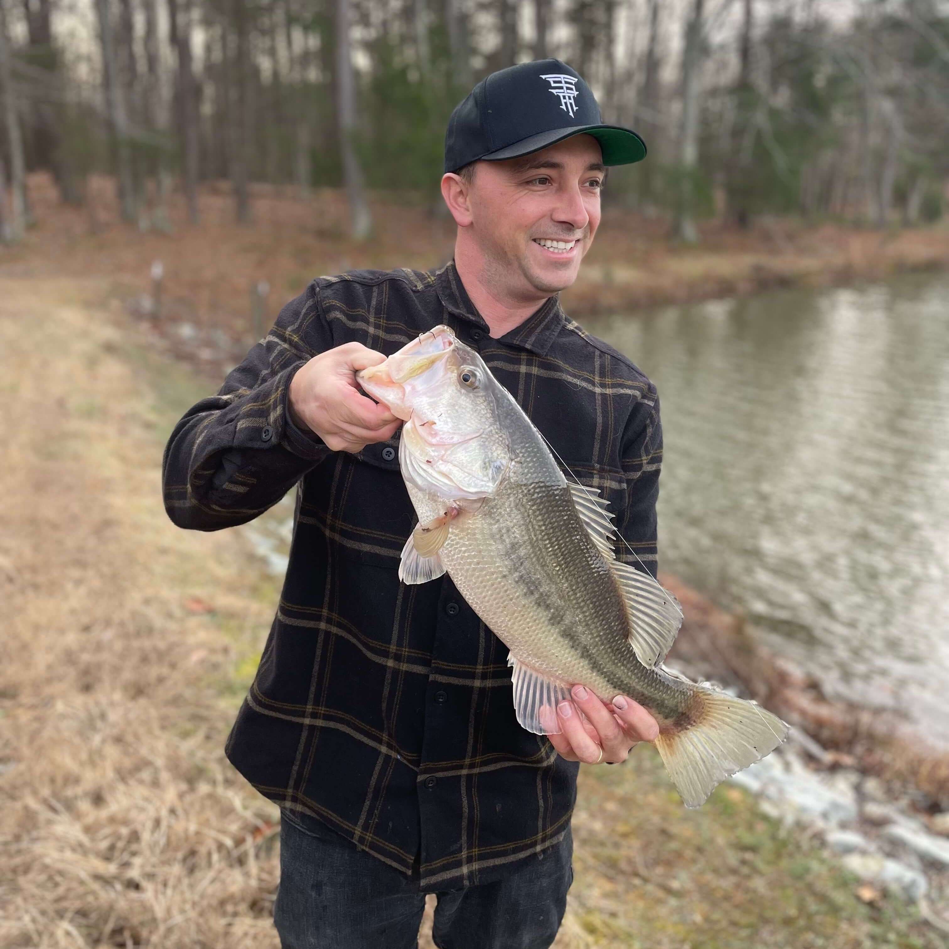 Image of John P with a monster 4 lbs bass caught using a TSA Fire Craw lure